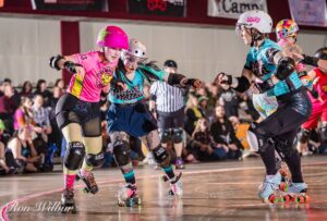 A Bodies of Water skater lays a big hit on a Maul Rats skater