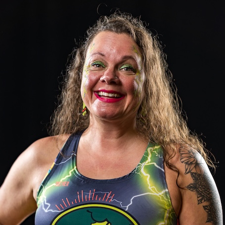 Lady Boomtown smiling at the camera